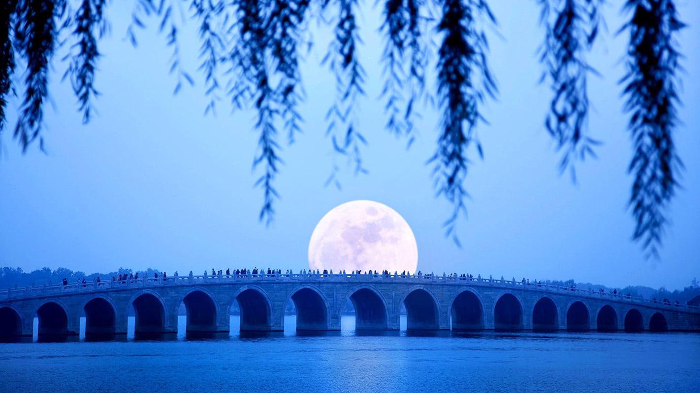 Summer Palace Beijing moonlit bridge across Kunming Lake